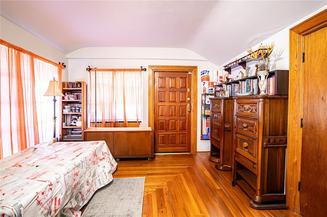 bedroom featuring lofted ceiling