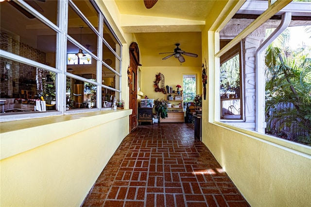 hall with lofted ceiling