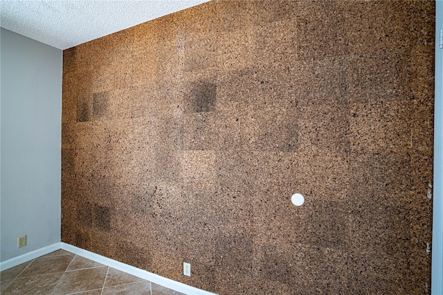 interior details featuring a textured ceiling