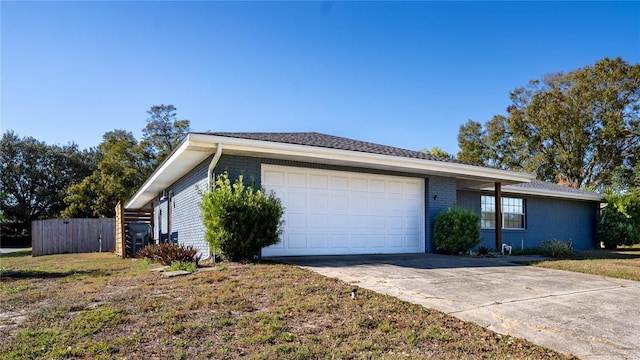 single story home with a garage