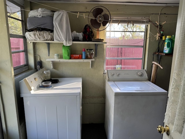 laundry room with washing machine and dryer