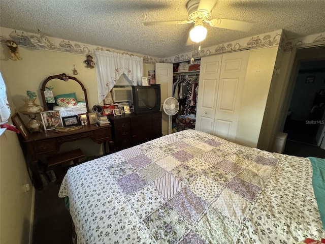 bedroom featuring ceiling fan, a closet, and a textured ceiling
