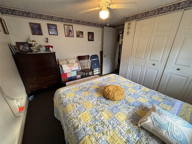 carpeted bedroom featuring a textured ceiling, a closet, and ceiling fan