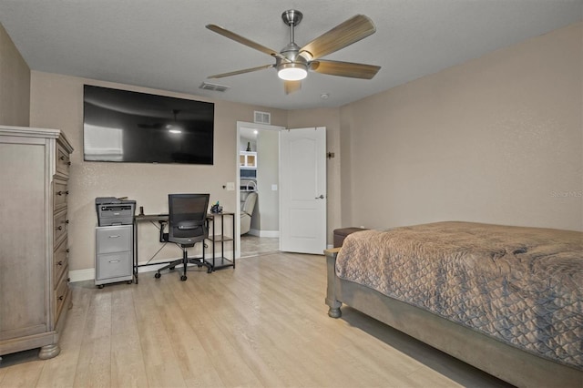 bedroom featuring light wood-type flooring and ceiling fan