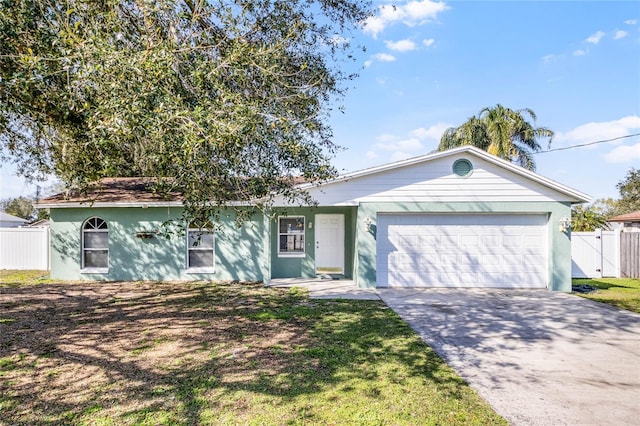 single story home with a garage