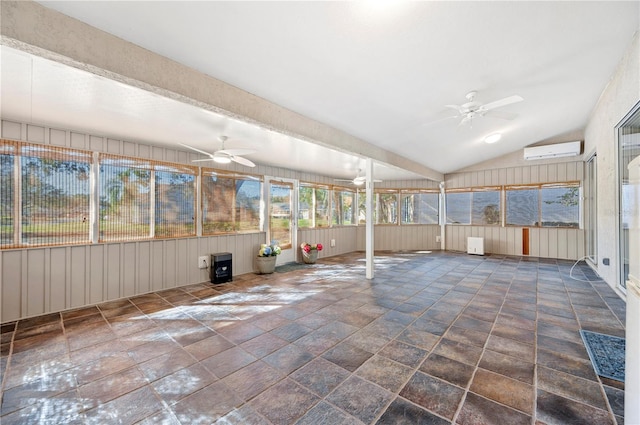 unfurnished sunroom with a wall mounted AC, lofted ceiling, and ceiling fan