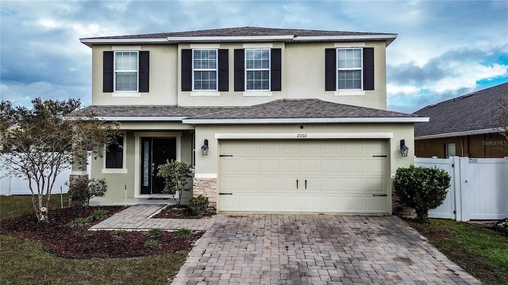 view of front of home with a garage