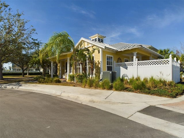 view of front of property featuring cooling unit