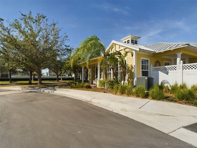 view of front of property with cooling unit