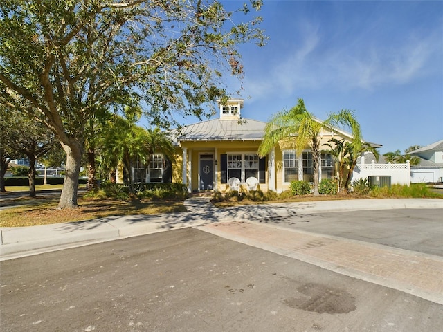 view of front of property featuring central AC unit