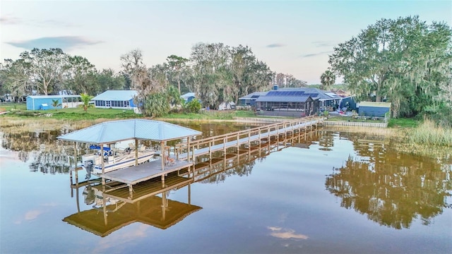 view of dock with a water view