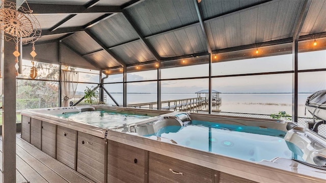 1769 S Lake Reedy Blvd, Frostproof, FL 33843 - view of swimming pool featuring an indoor hot tub and a water view