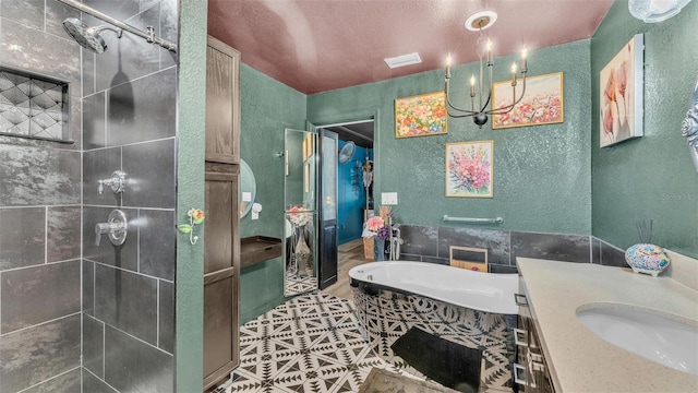 1769 S Lake Reedy Blvd, Frostproof, FL 33843 - bathroom with a bath, vanity, a textured wall, tiled shower, and tile patterned flooring