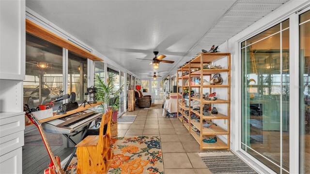 1769 S Lake Reedy Blvd, Frostproof, FL 33843 - sunroom featuring a ceiling fan and tile patterned flooring