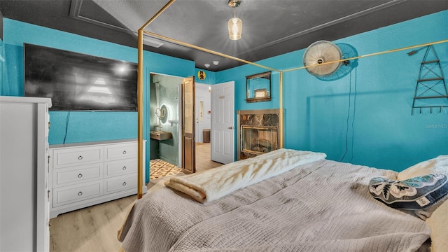 bedroom with light wood-type flooring