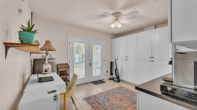 interior space with french doors and ceiling fan