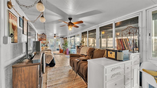 1769 S Lake Reedy Blvd, Frostproof, FL 33843 - sunroom featuring healthy amount of natural light, a ceiling fan, and tile patterned flooring