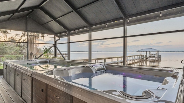 1769 S Lake Reedy Blvd, Frostproof, FL 33843 - dock area with a water view and an indoor hot tub