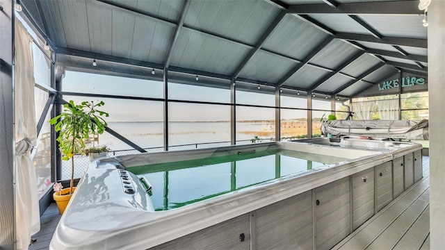1769 S Lake Reedy Blvd, Frostproof, FL 33843 - view of swimming pool featuring a water view and an indoor hot tub