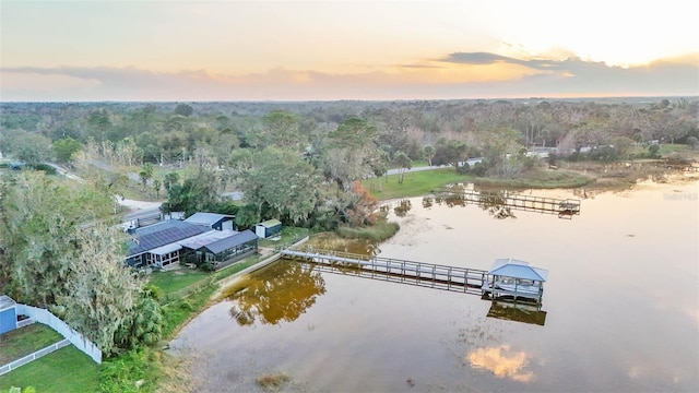 1769 S Lake Reedy Blvd, Frostproof, FL 33843 - aerial view at dusk of a water view and a wooded view