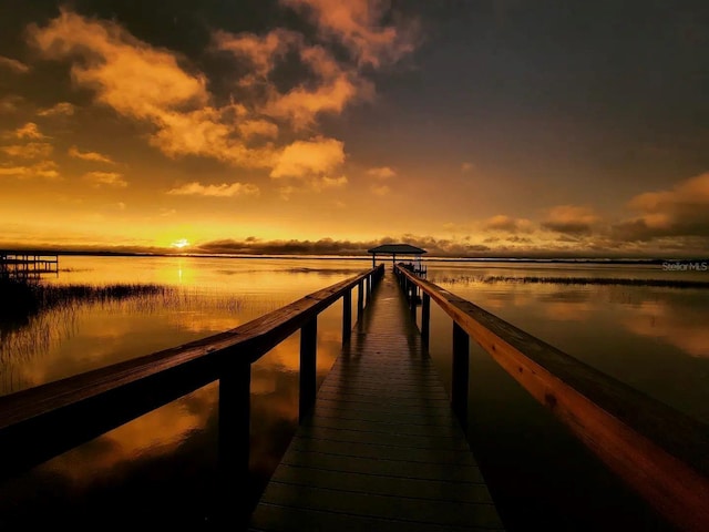 view of dock with a water view