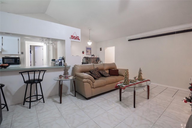 living room featuring vaulted ceiling