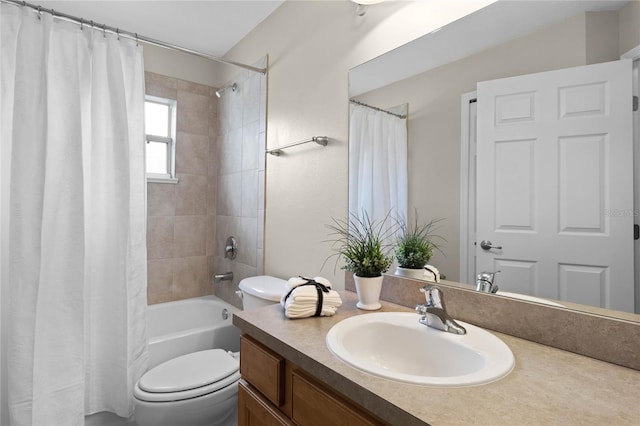 full bathroom with vanity, toilet, and shower / bath combo with shower curtain