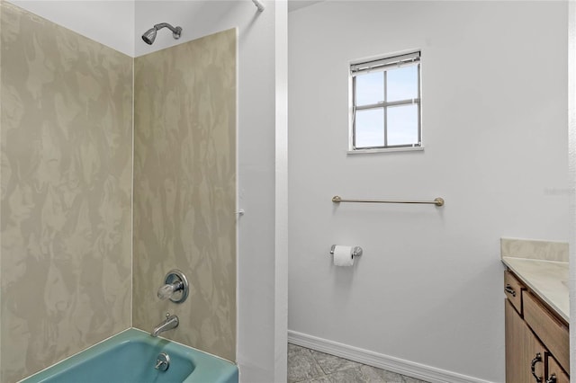 bathroom with vanity and  shower combination