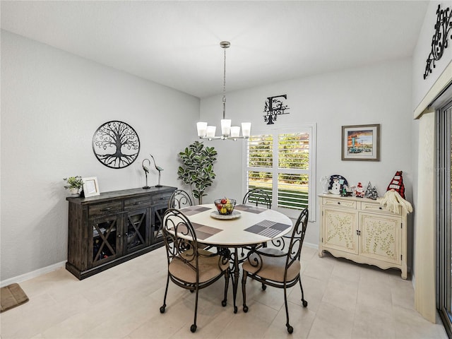 dining room with a chandelier