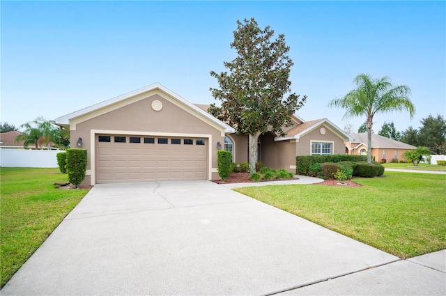 single story home featuring a front lawn and a garage