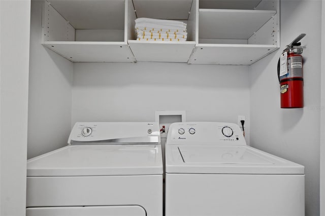 laundry room featuring independent washer and dryer