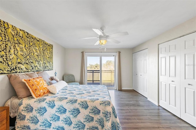 bedroom featuring access to exterior, ceiling fan, dark hardwood / wood-style floors, and multiple closets