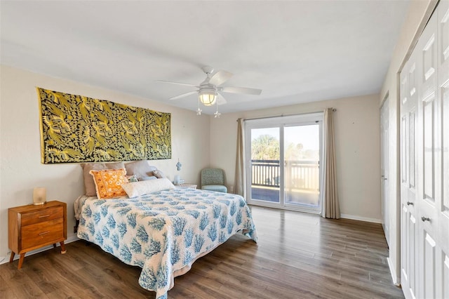 bedroom with ceiling fan, dark hardwood / wood-style flooring, access to outside, and a closet