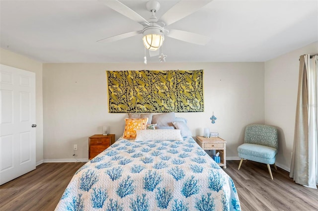 bedroom featuring ceiling fan and hardwood / wood-style flooring