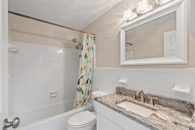 full bathroom featuring tile walls, vanity, shower / tub combo, and toilet