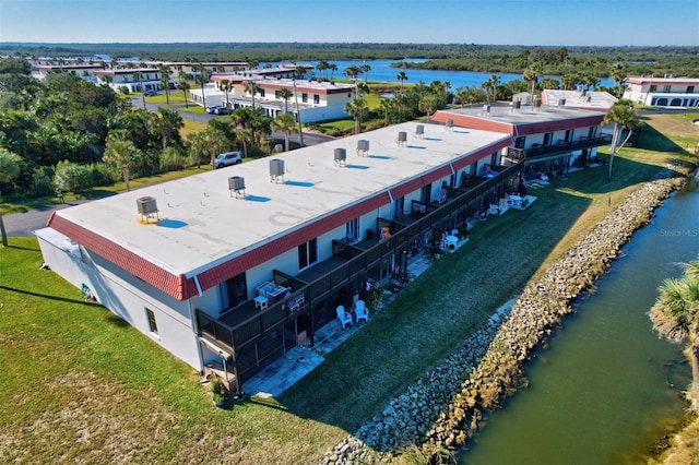 bird's eye view with a water view