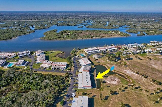 birds eye view of property featuring a water view