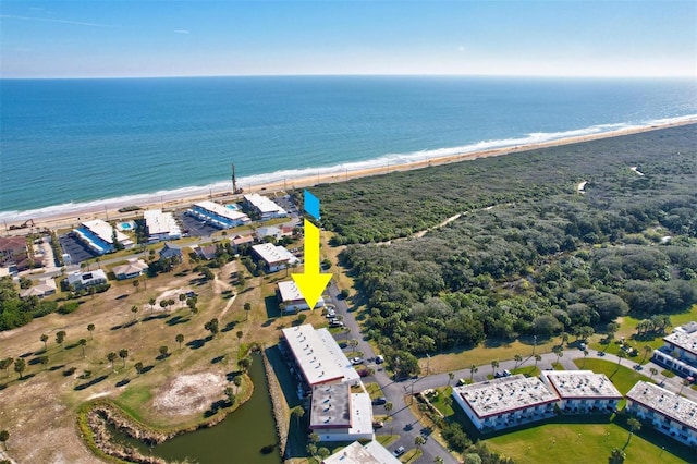 aerial view with a water view and a view of the beach