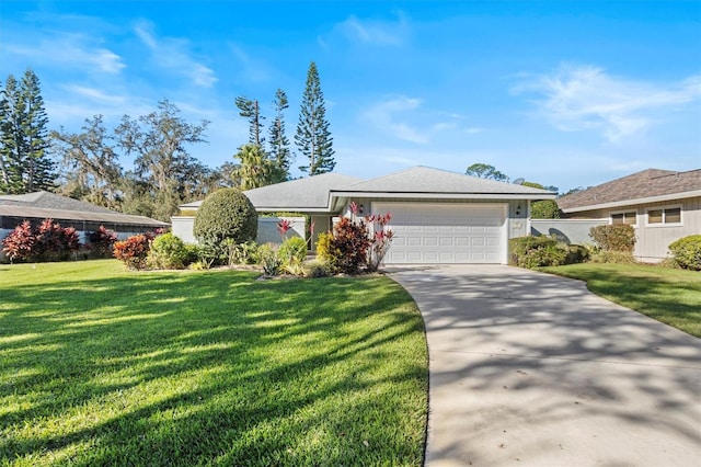 ranch-style home with a front yard and a garage