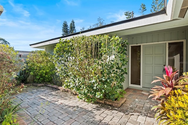 property entrance with a patio