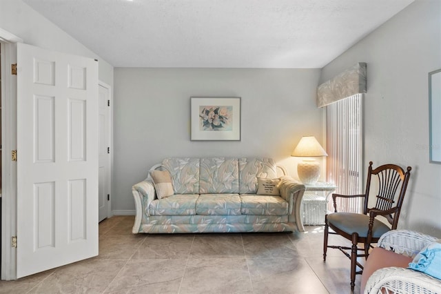 living room featuring a textured ceiling