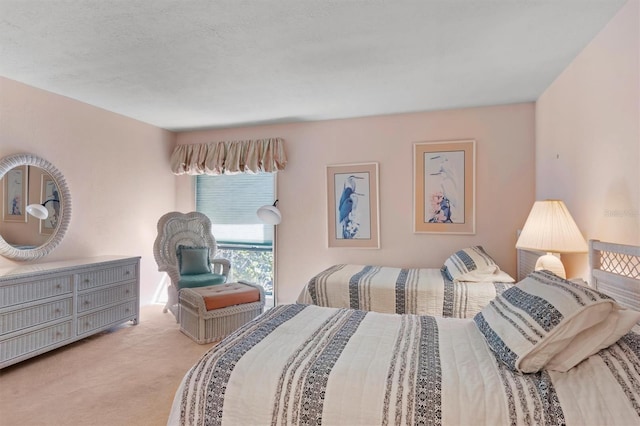 bedroom with light colored carpet