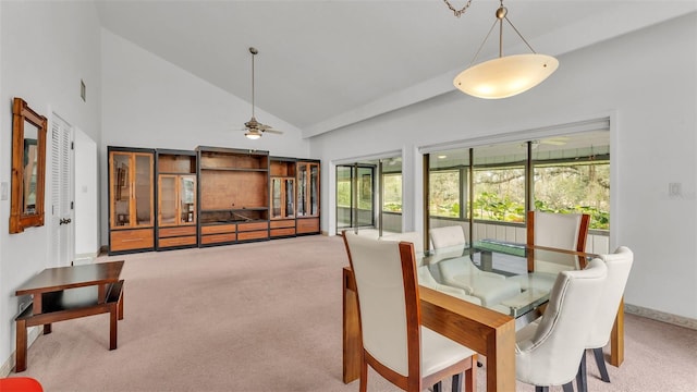 dining area featuring carpet floors, ceiling fan, and a healthy amount of sunlight