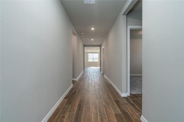 hall featuring dark hardwood / wood-style flooring