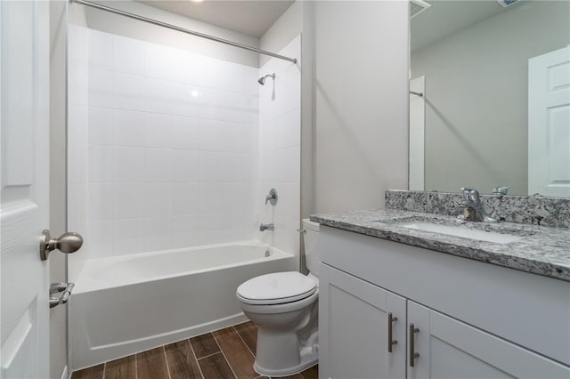 full bathroom featuring vanity, toilet, and shower / washtub combination