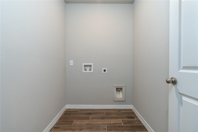 laundry area featuring washer hookup, electric dryer hookup, and dark hardwood / wood-style floors