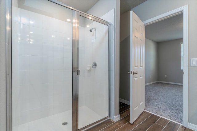 bathroom with an enclosed shower