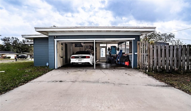 garage featuring a lawn