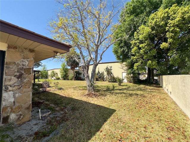 view of yard with fence