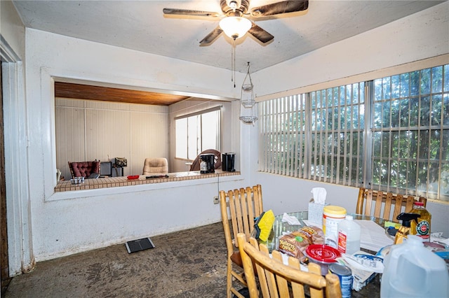 dining area featuring plenty of natural light and ceiling fan